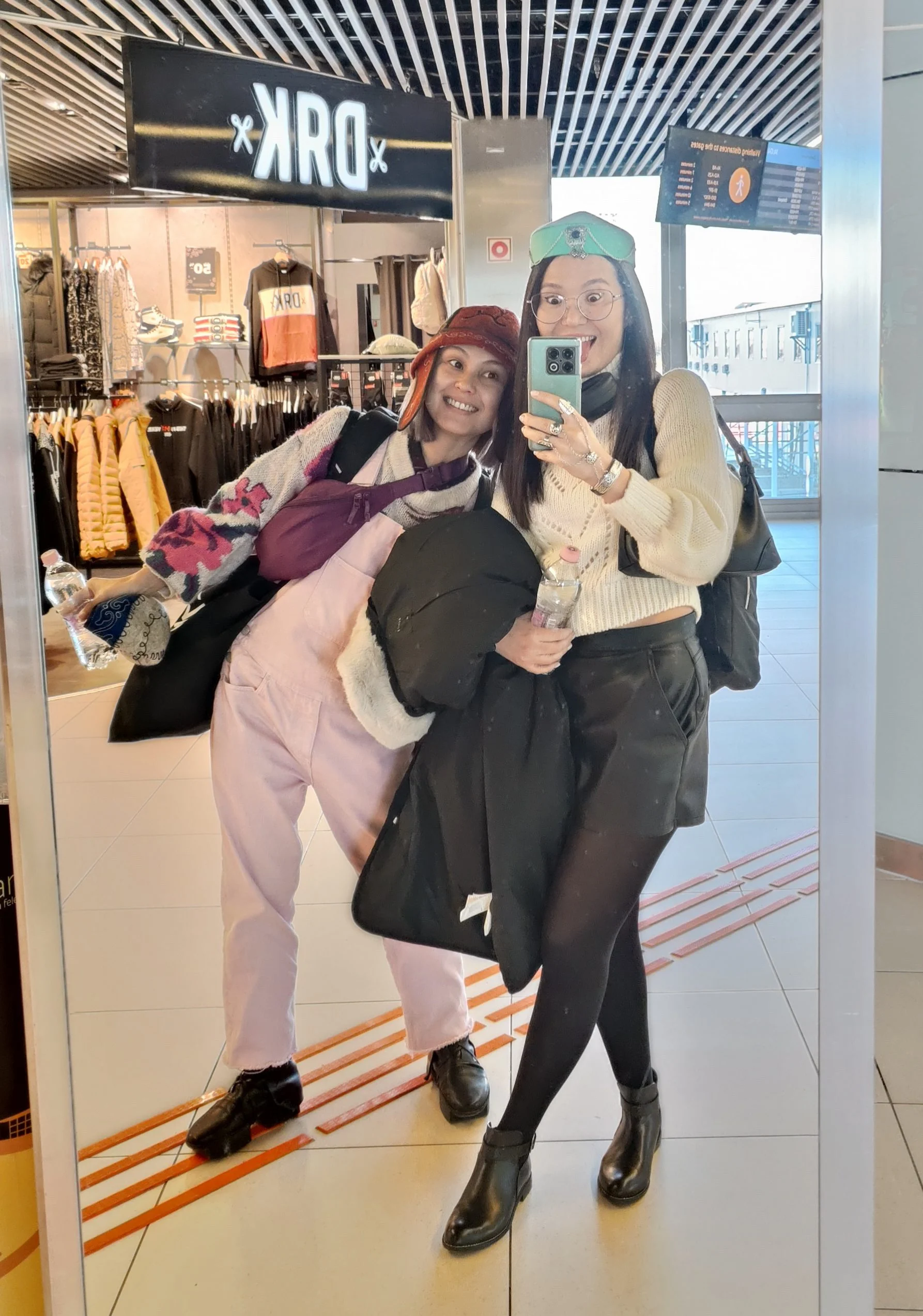 Figure 4. Me and my friend Anara Bekmukhambetova both wearing Qazaq traditional headdresses at Budapest international airport. 27 December 2022, Budapest, Hungary. Anara Bekmukhambetova